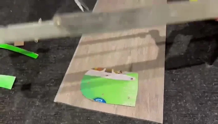 Cut the vinyl plank to the shape of the template using a handsaw or jigsaw.