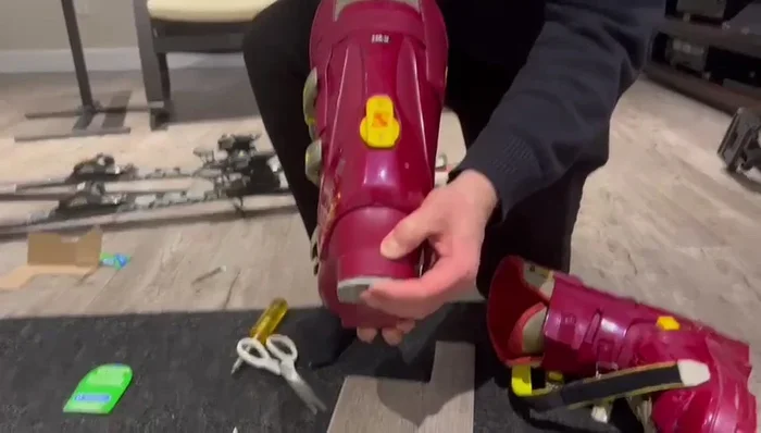 Attach the vinyl plank replacement to the ski boot using the screws and previously drilled holes.