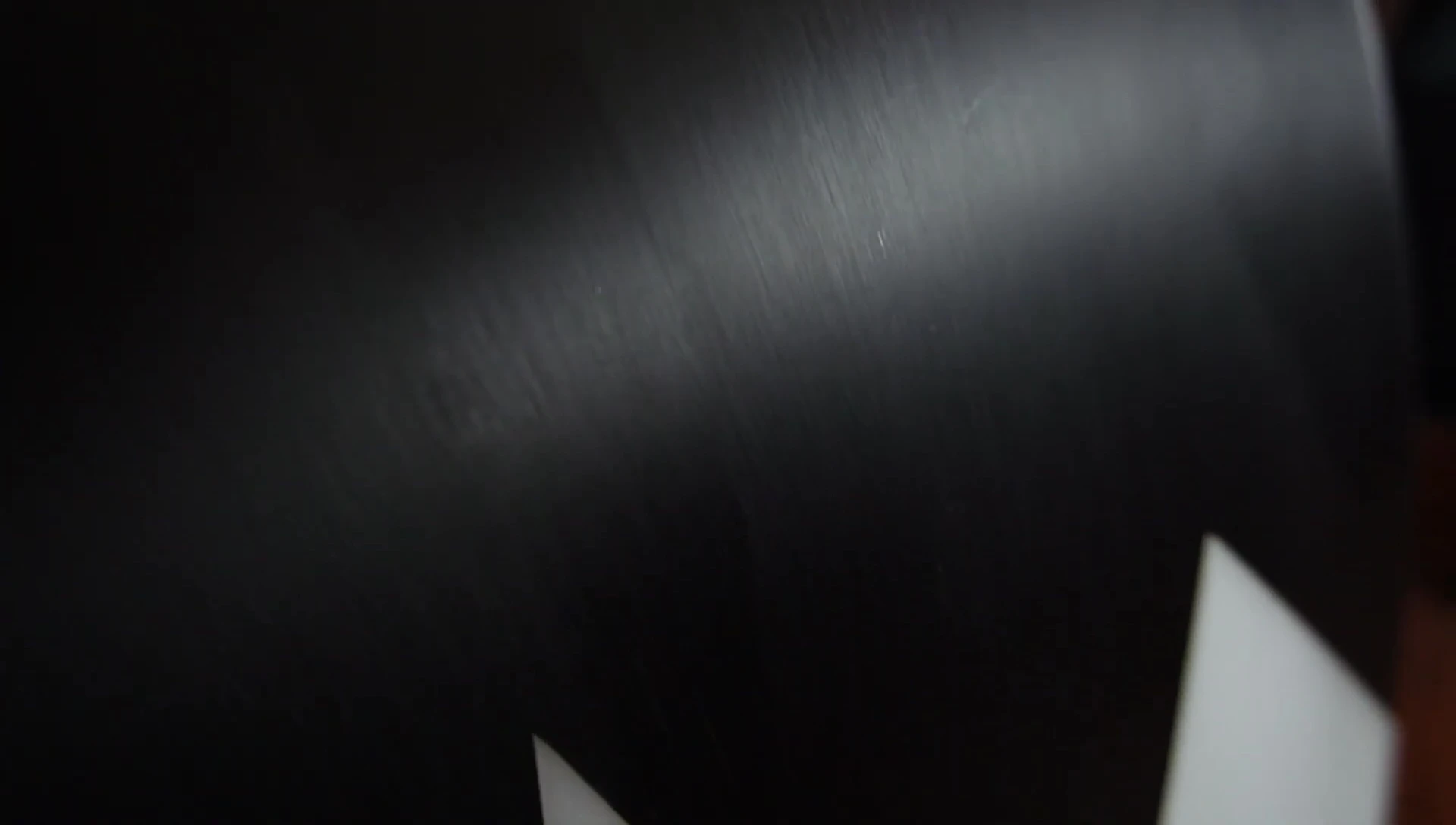 Close-up of the snowboard base showing the texture.