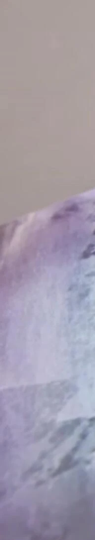 Snowboarder performing a turn at high speed