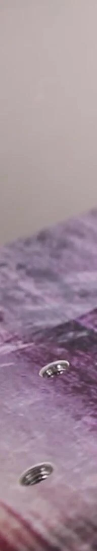 Close-up of the snowboard's sintered base