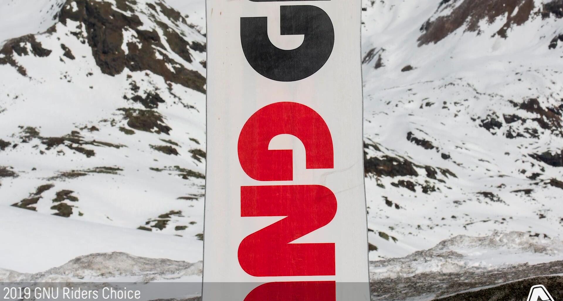 Close-up of the snowboard's core, showcasing its wood construction.