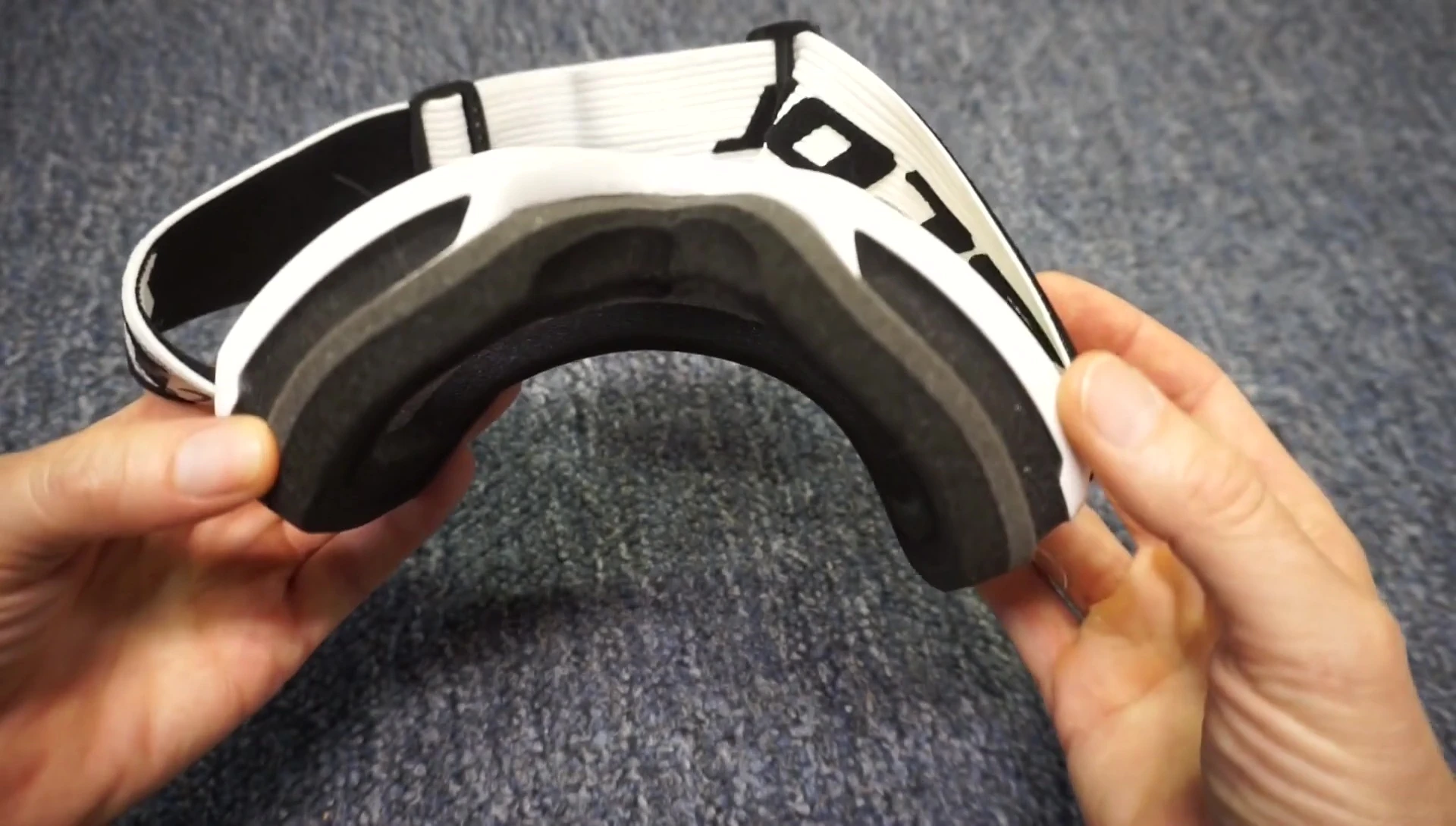 Demonstration of cleaning the lenses with water.