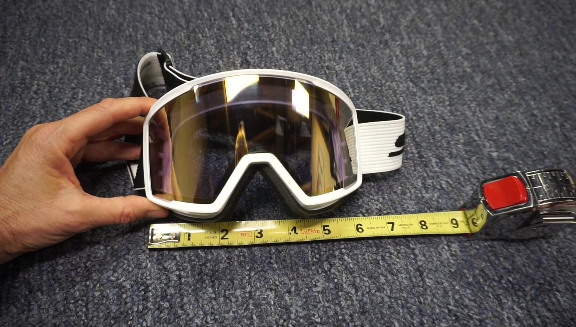 A clear image showing the goggle on the reviewer's face, highlighting the fit.
