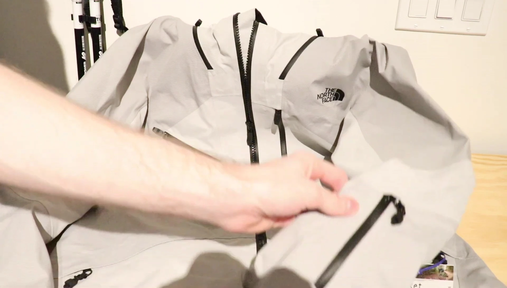 Close-up of the left arm pocket with microfiber cloth