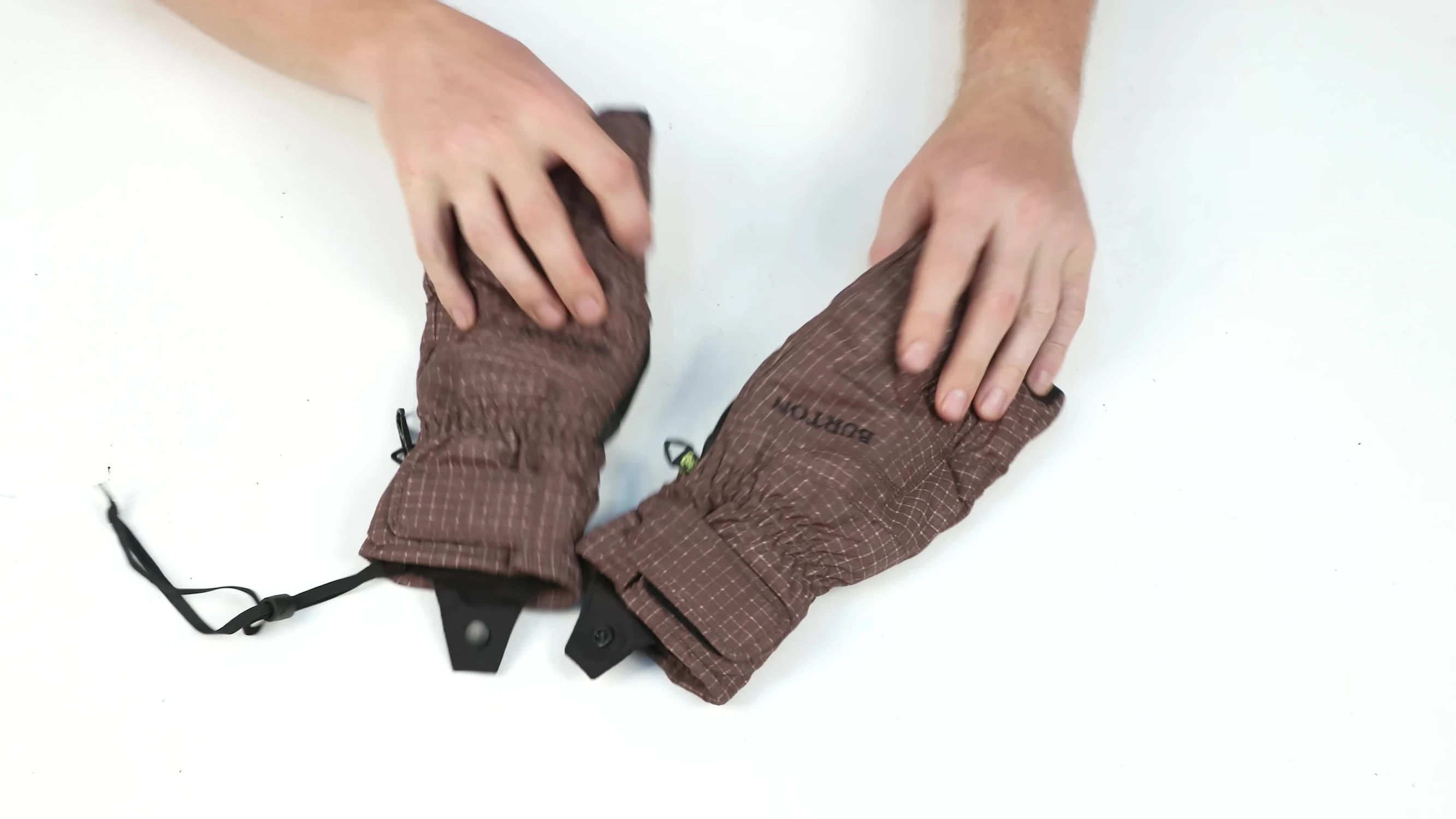 Close-up showcasing the glove's material and construction details.