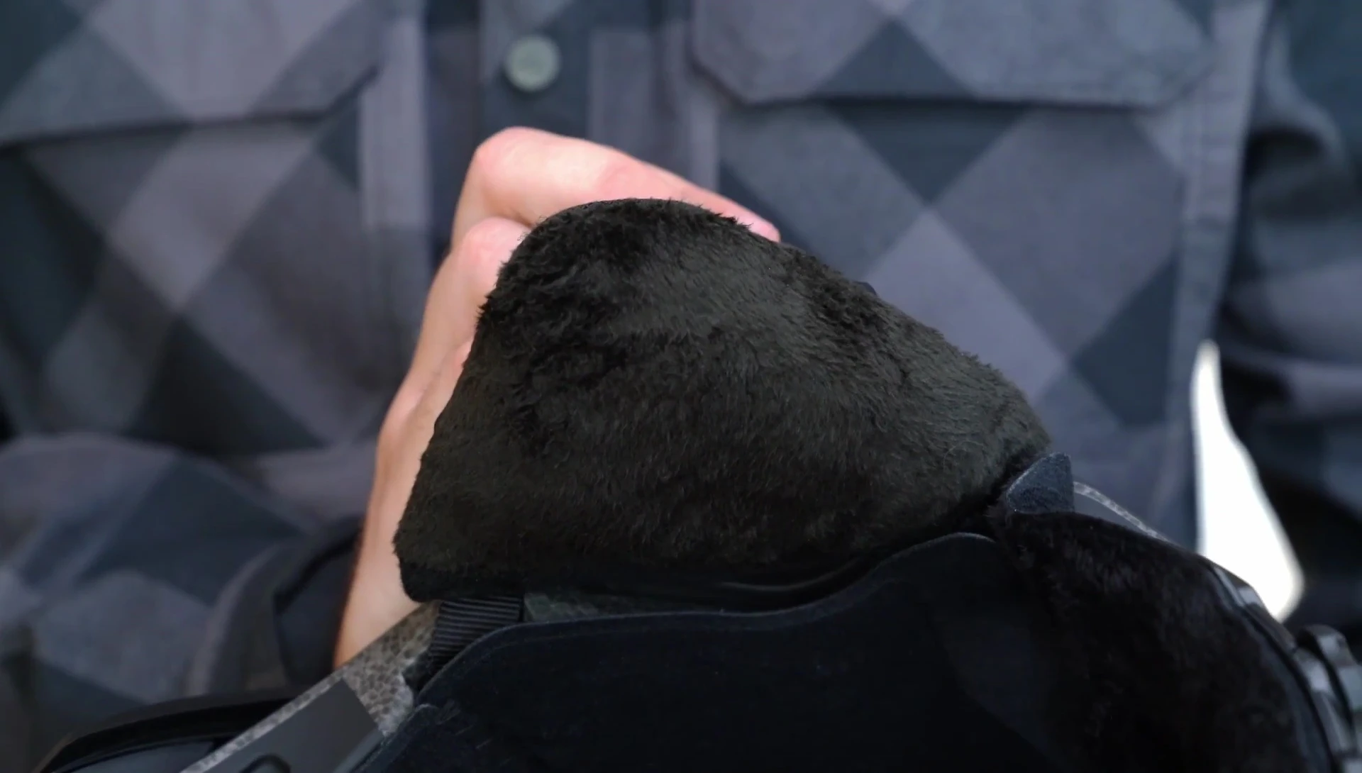 Close-up of the helmet's interior lining and removable ear pads.