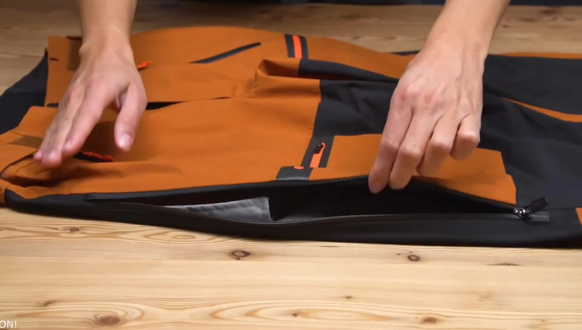 Close up shot highlighting the adjustable waist and leg vents