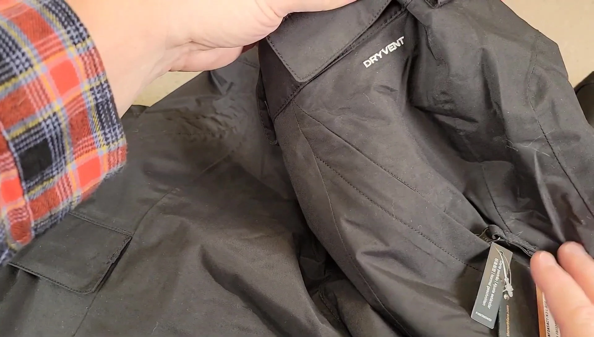 A shot emphasizing the water-resistant quality of the pants.