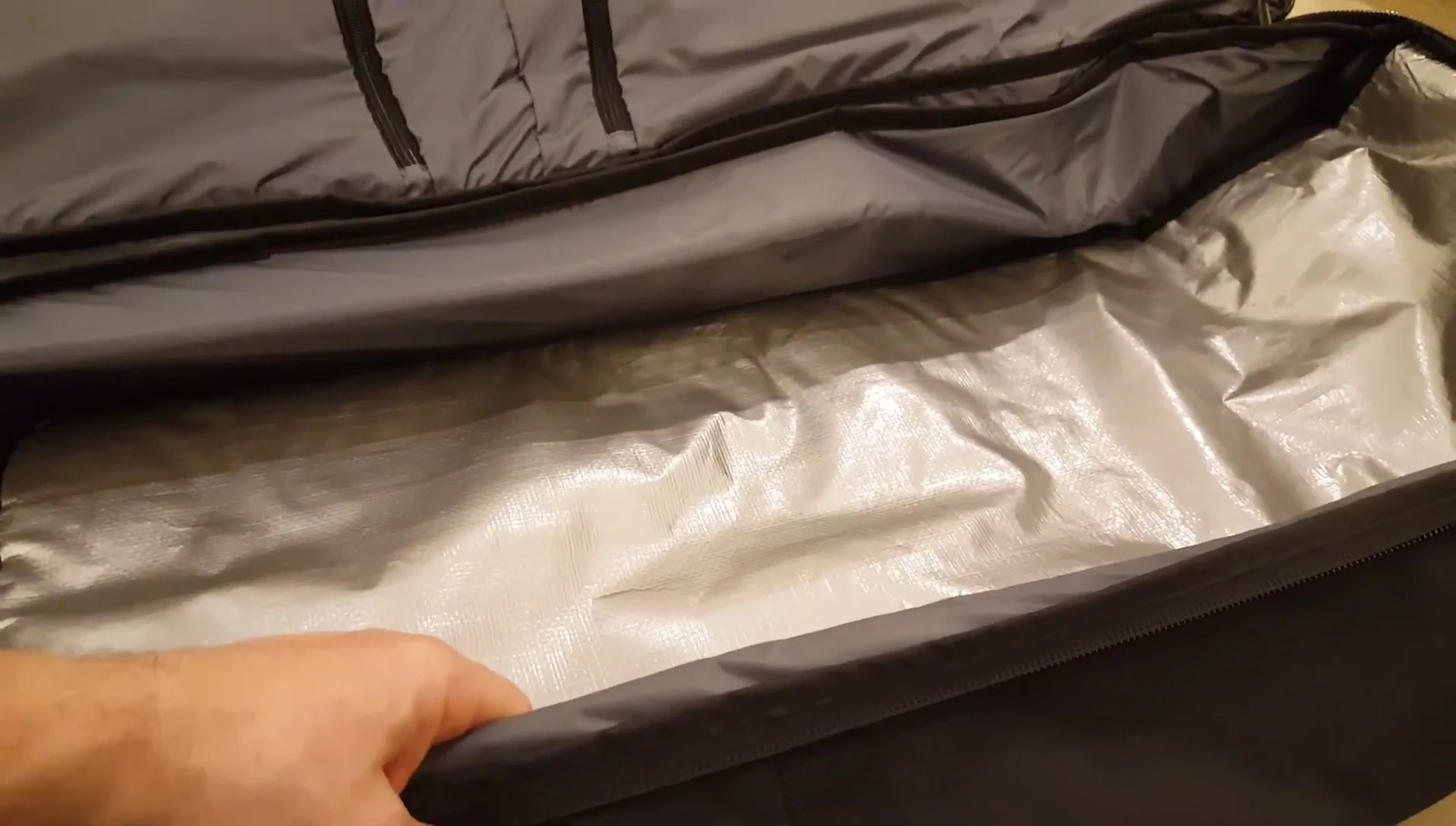 The external straps of the Dakine High Roller securing the bag