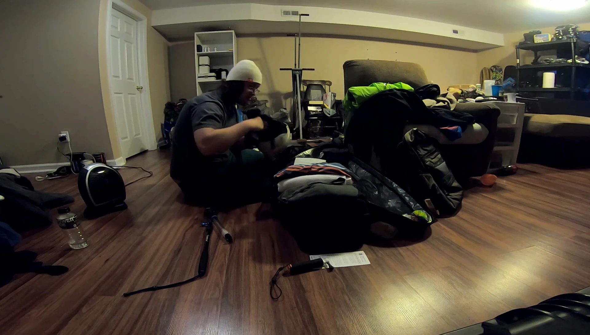 Using the helmet to store smaller items to save space.
