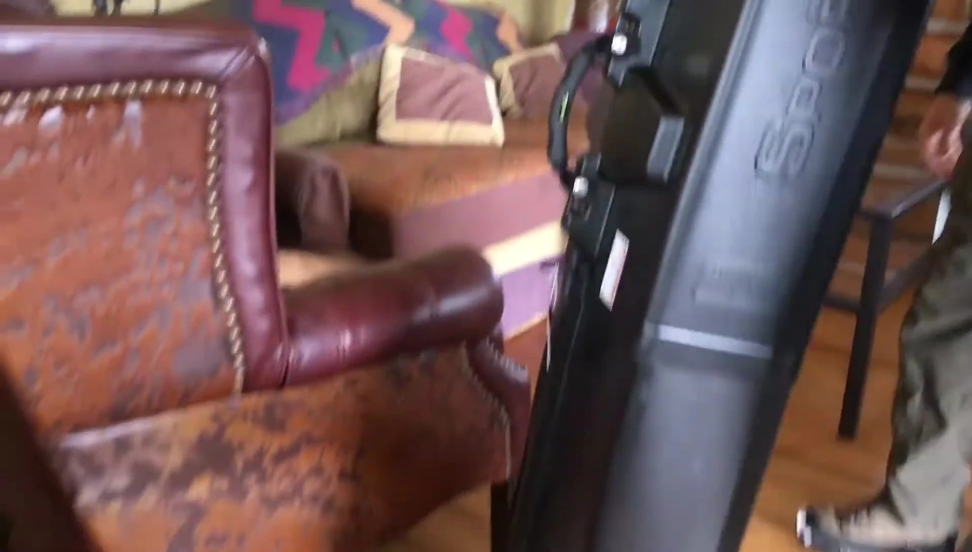 The Sportube case being rolled along the floor.