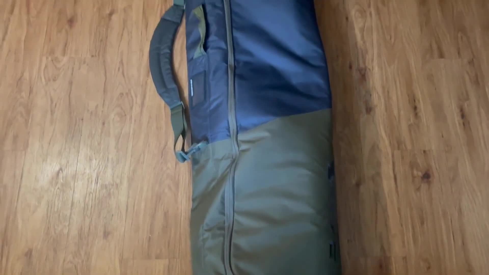 Exterior view of the Dakine Tour snowboard bag showing its size and capacity.