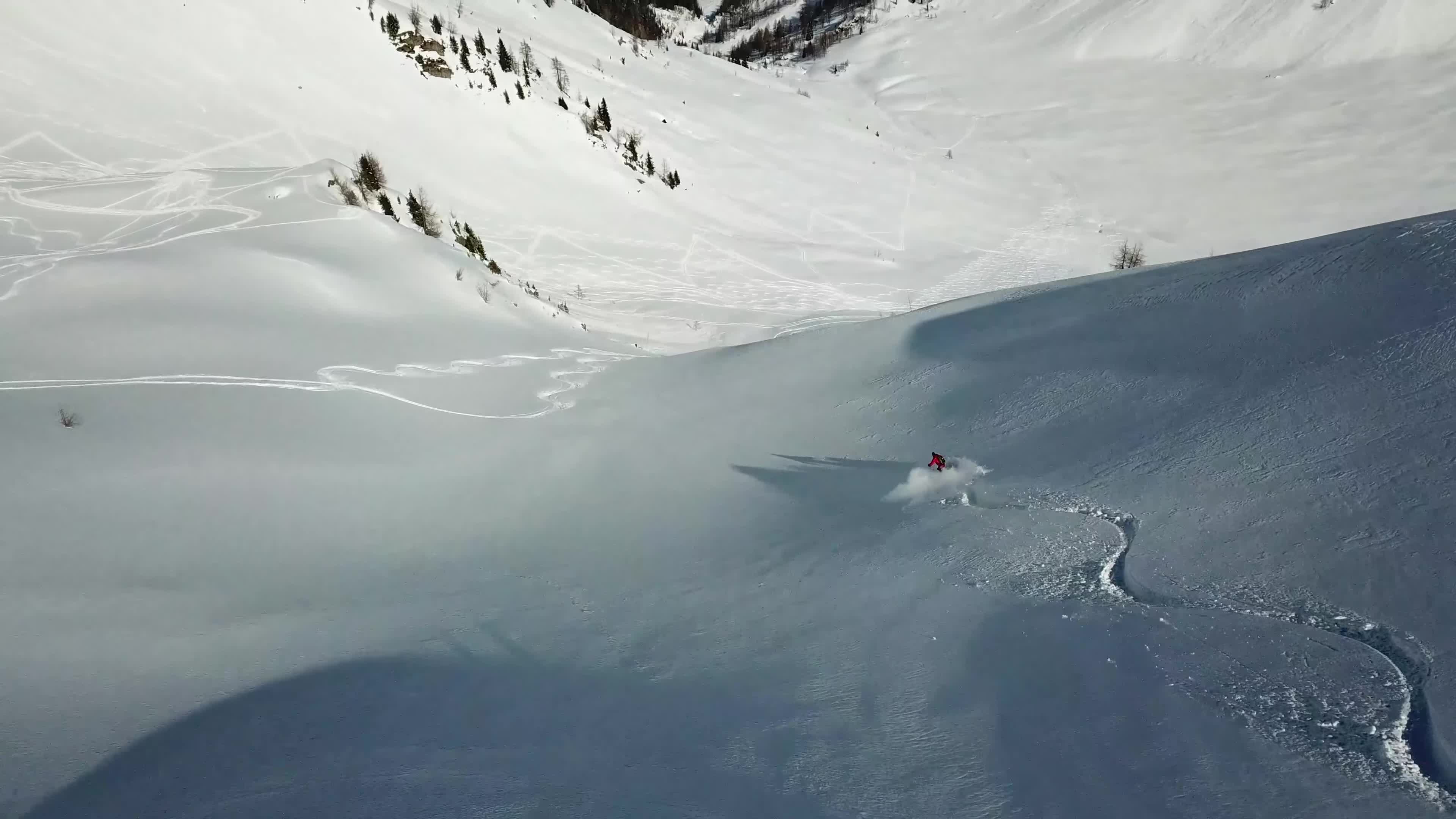Close-up shot of a skier navigating challenging terrain.
