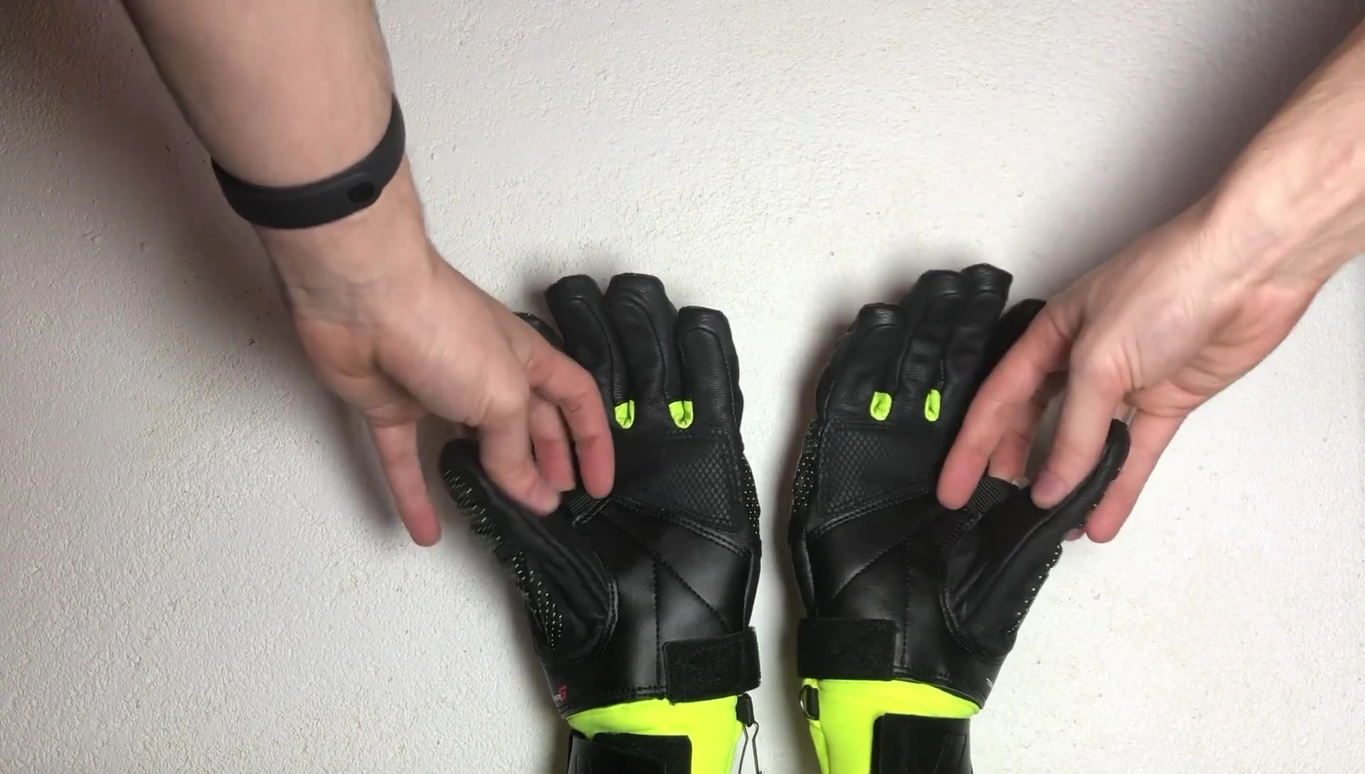 Comparison shot showing the asymmetry between the two gloves.