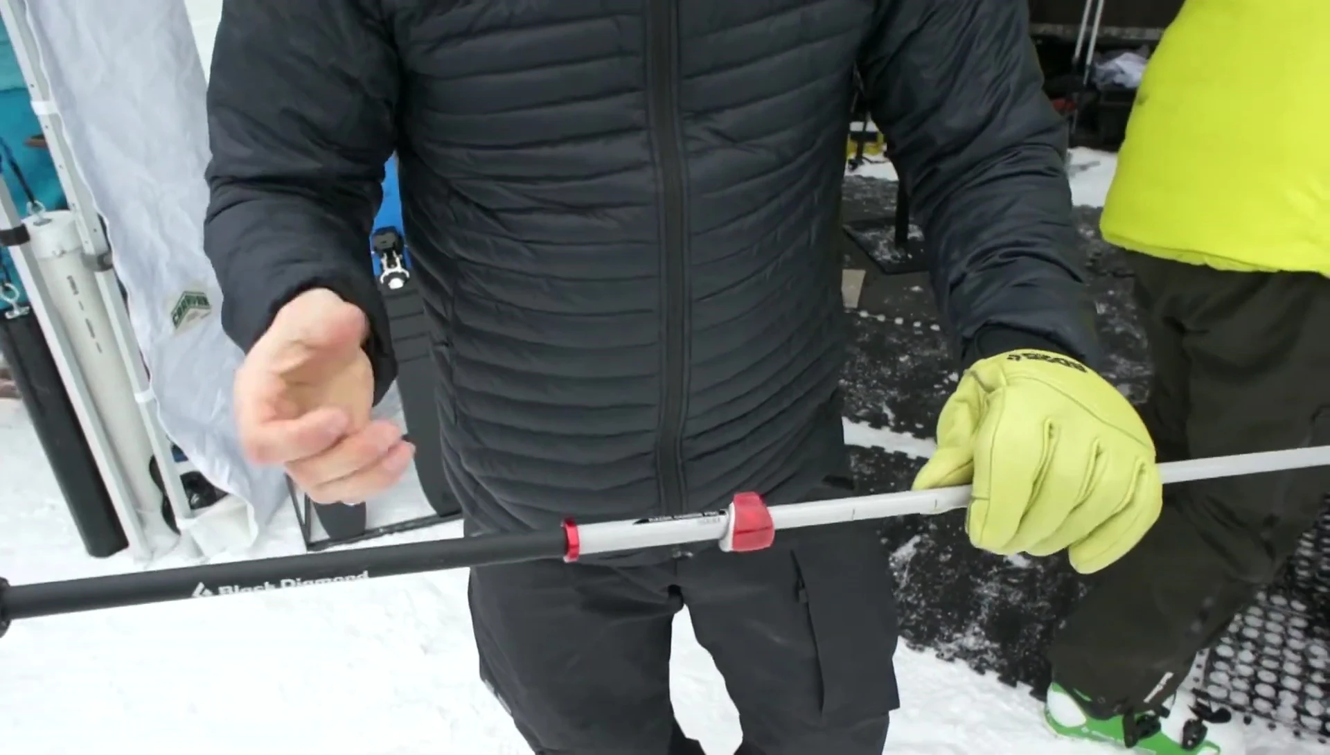 Close-up highlighting the soft-touch grip of the pole.