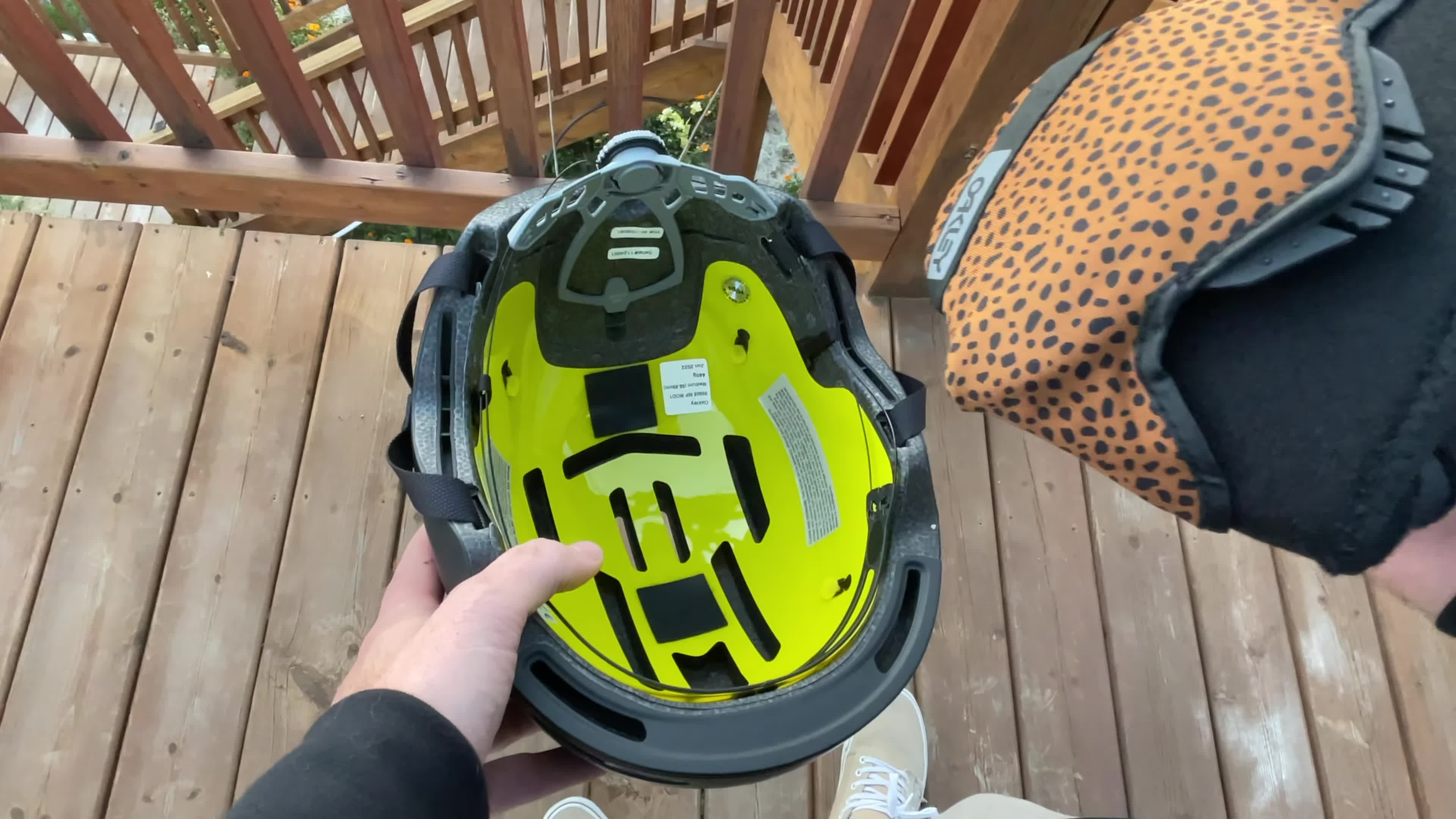 Close-up of the Oakley Mod1 helmet with ear muffs attached.