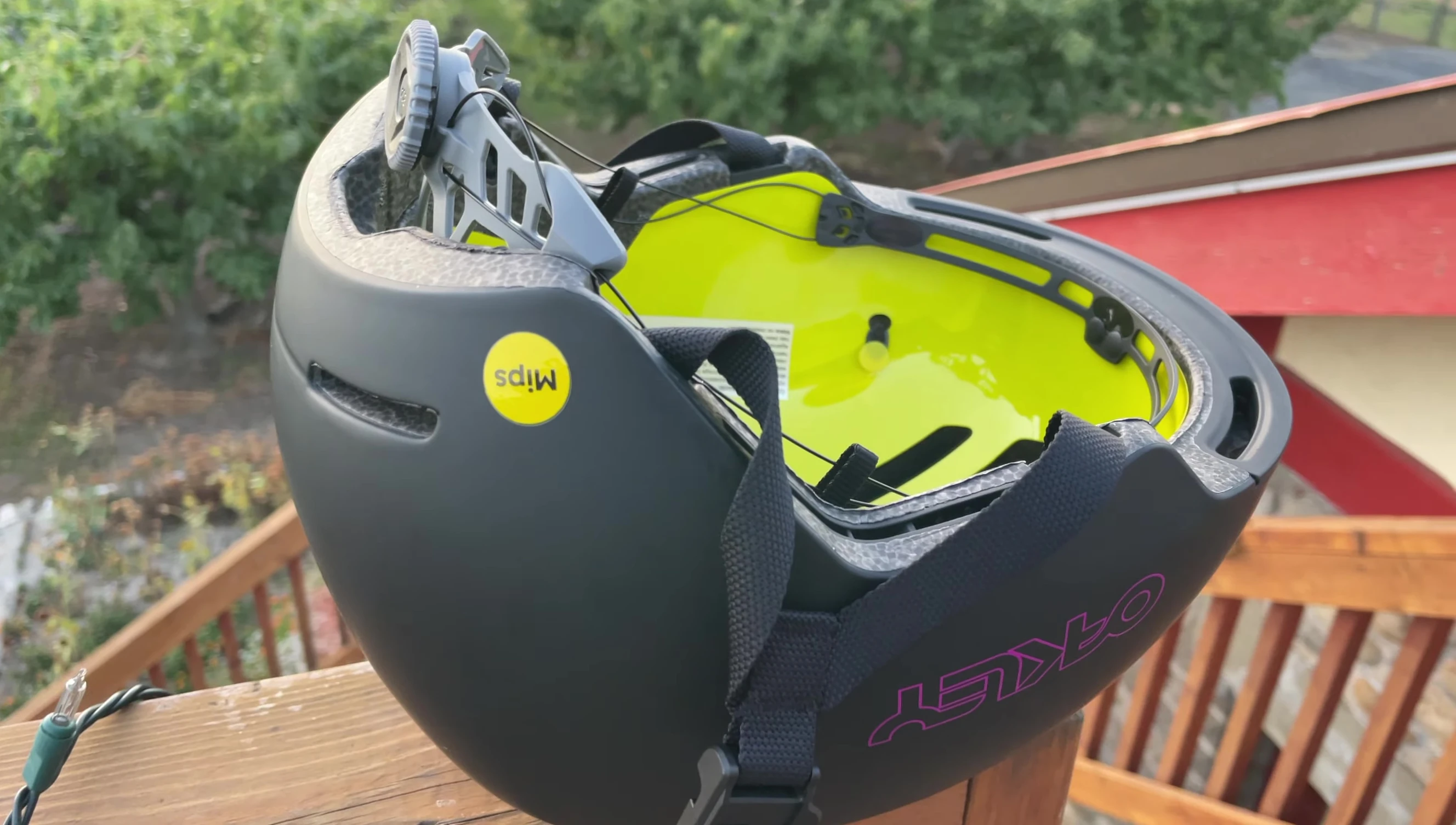 The speaker emphasizing the lightweight nature of the helmet.