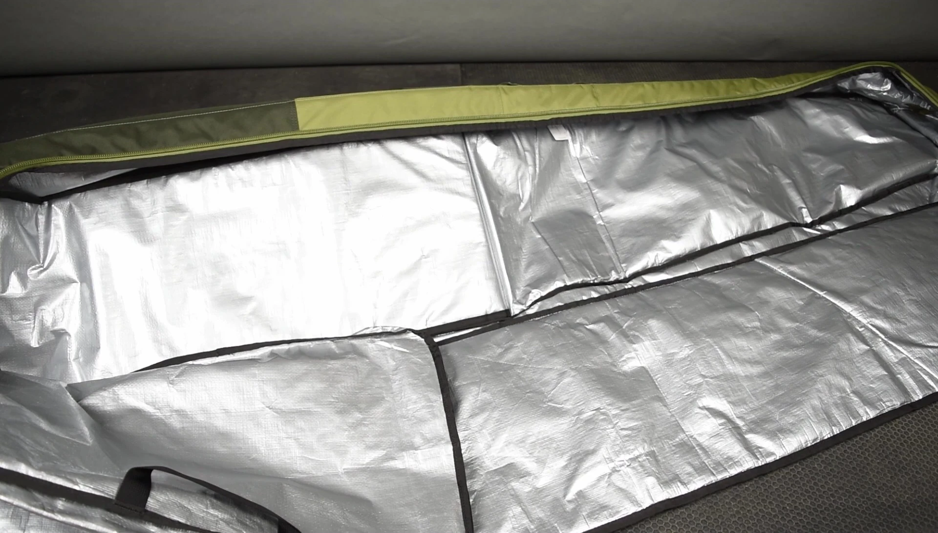 Close-up shot emphasizing the bag's durable material and reinforcement.