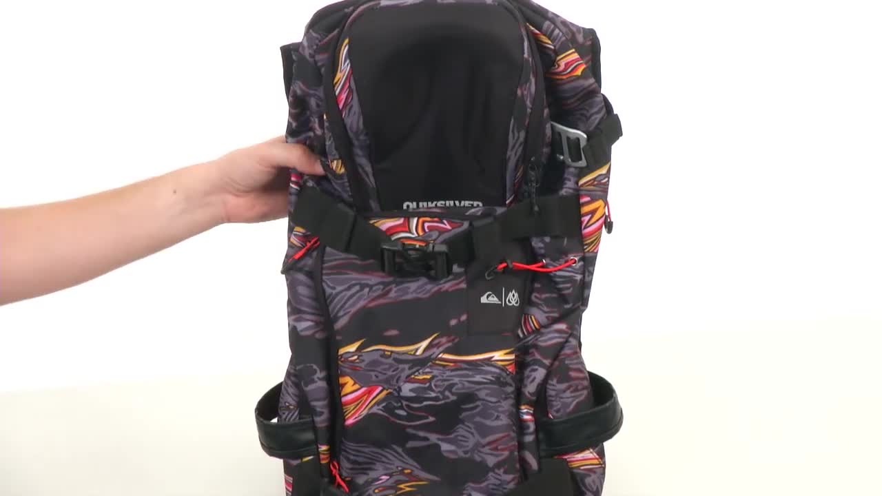 View of the board straps on the exterior of the backpack
