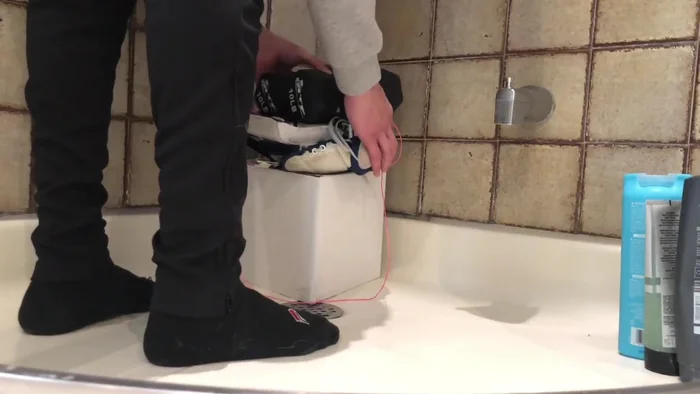 Place the tied-up glove in a hot, steamy shower or use a steamer to warm the glove for about 10-15 minutes.