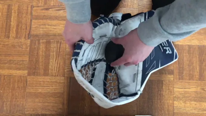 Add weights (optional) to further secure the puck and maintain pressure.