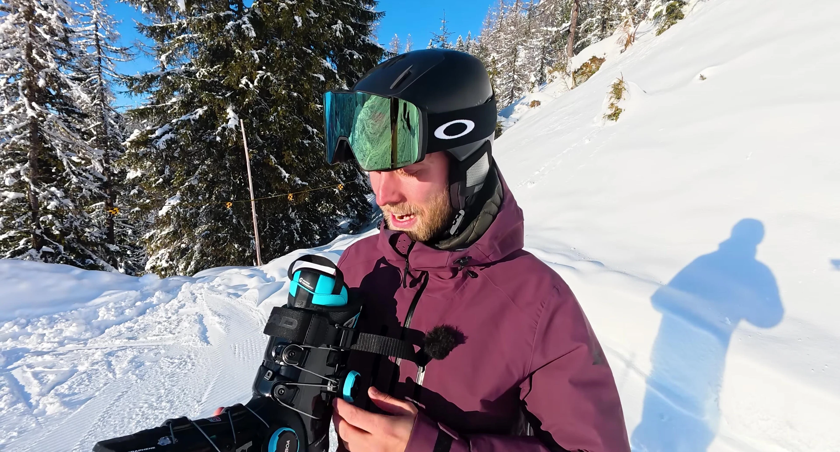Opening the ski boot and power strap.