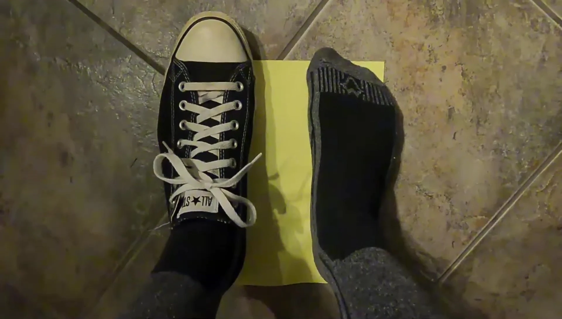 Measuring foot length with an 11-inch piece of paper