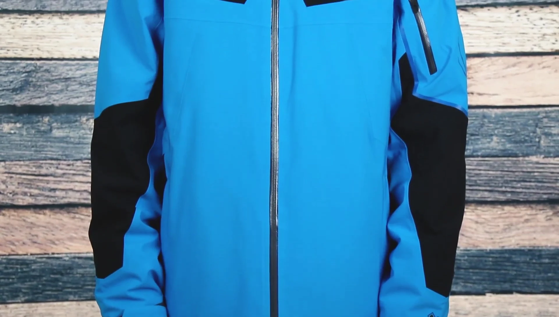 The model wearing the jacket in an outdoor setting.