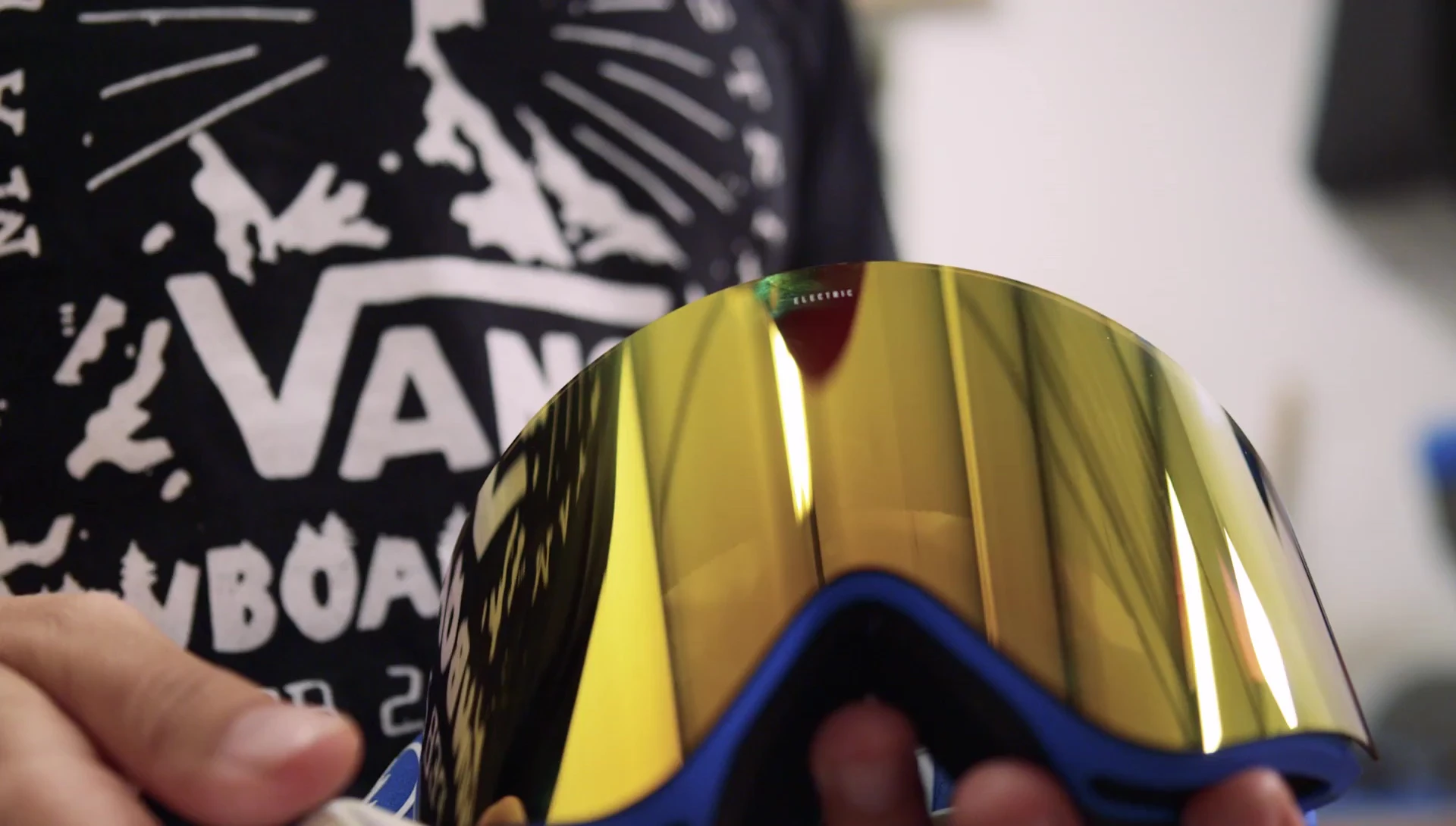 A bronze chrome goggle lens