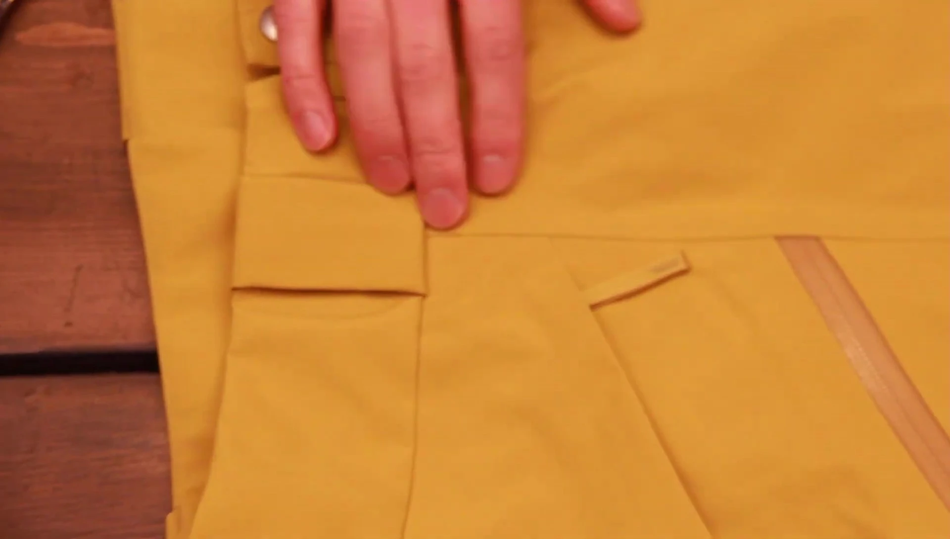 Close up of the taped seams on the pants.