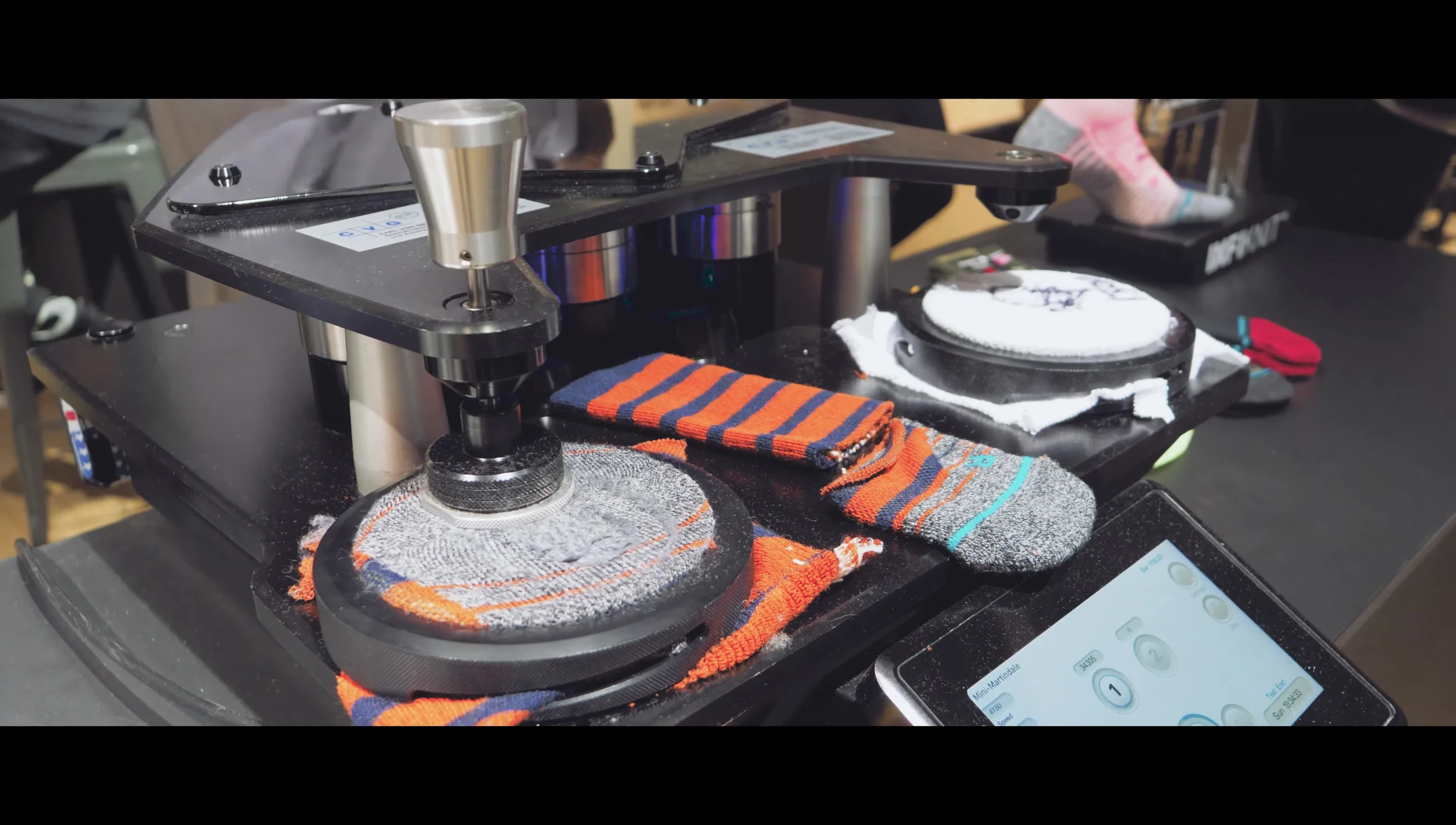 The competitor sock showing significant wear after 1300 cycles.