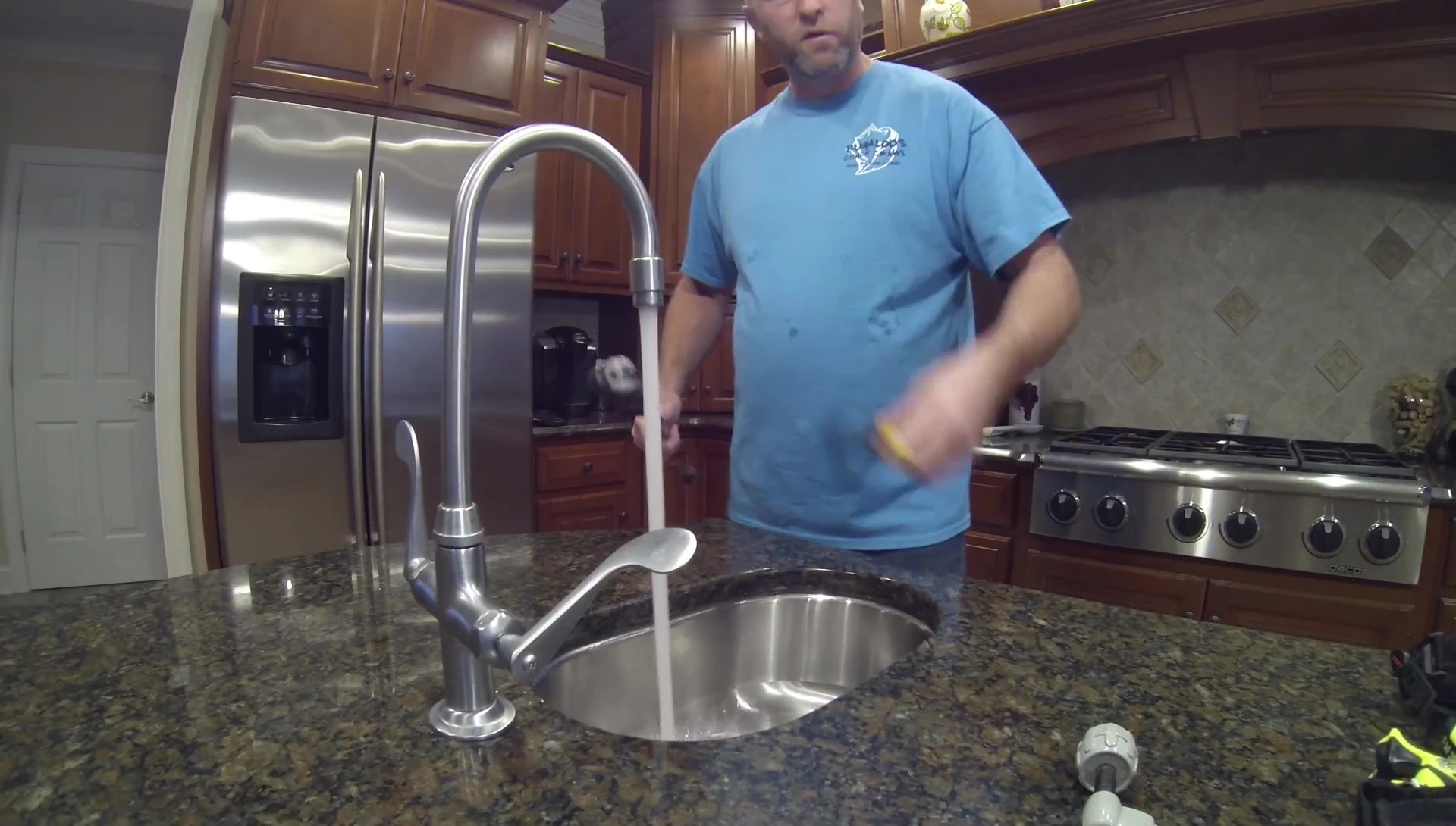 Submerging ski pole grips in hot water