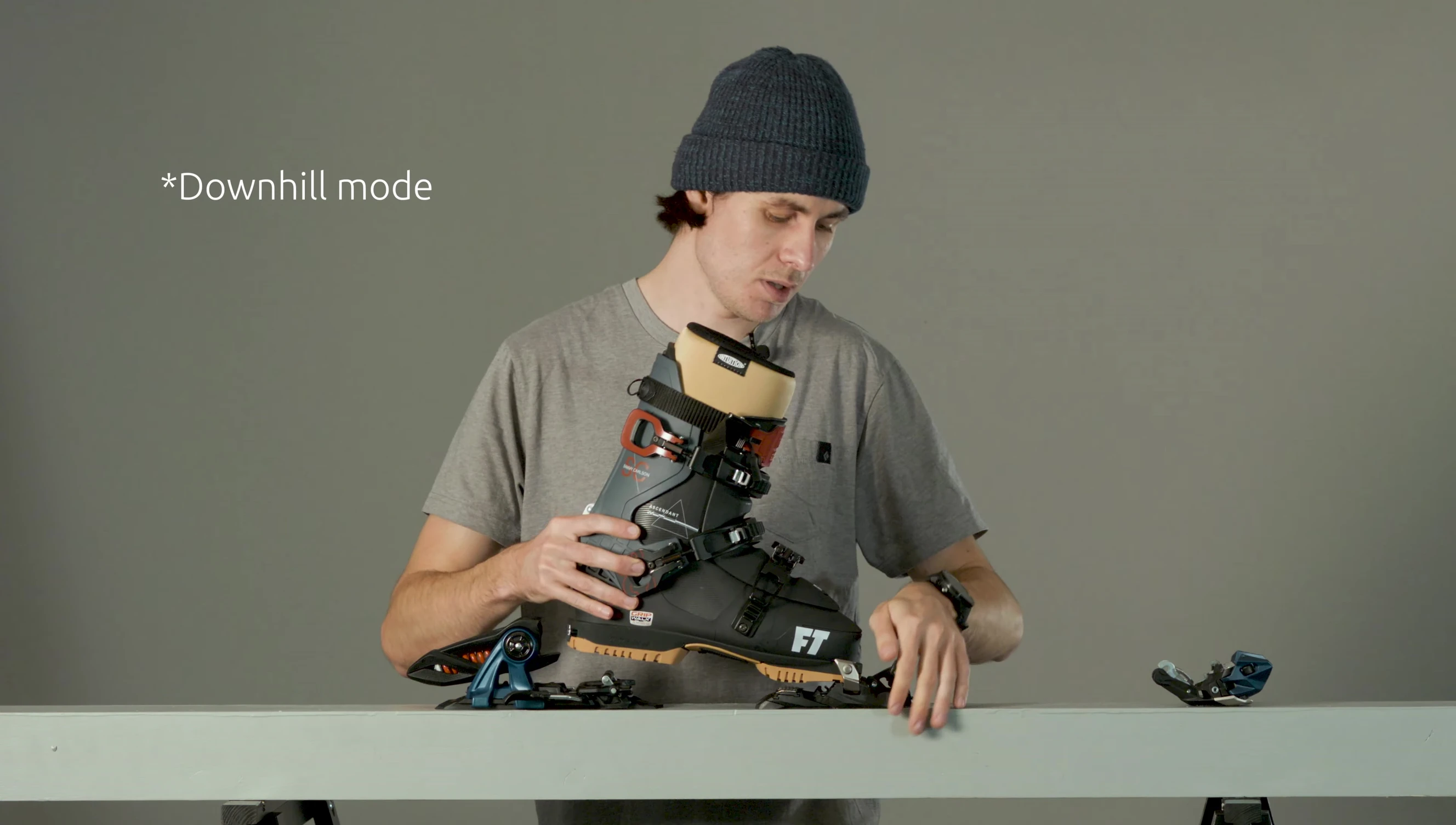 The process of transitioning from touring to downhill mode is shown clearly.