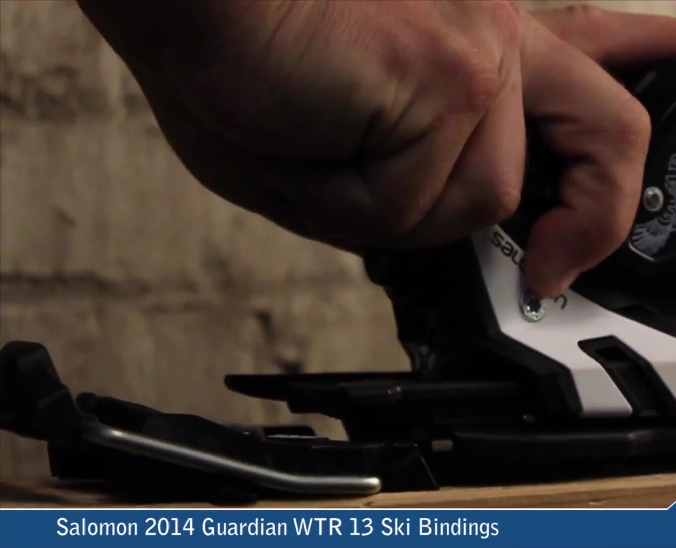 The binding mounted on a ski, showcasing its compatibility.