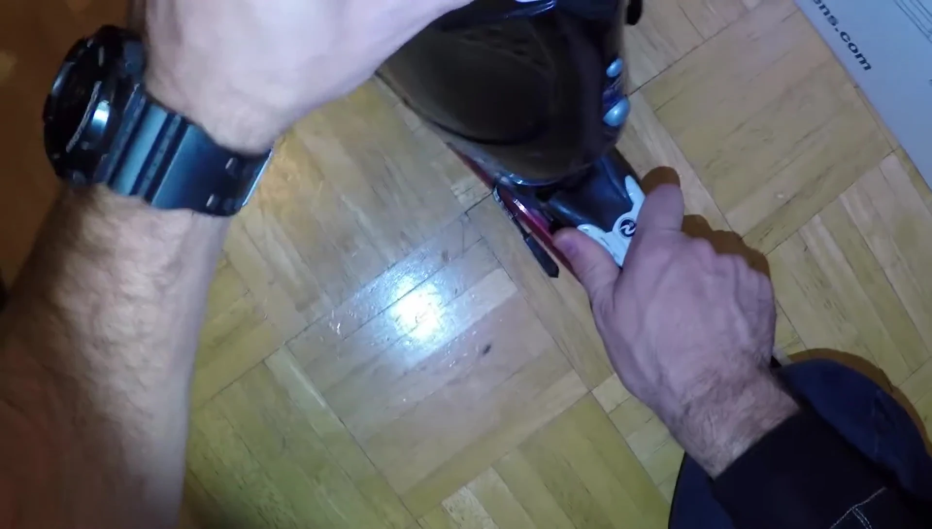 Testing the newly installed bindings with ski boots.