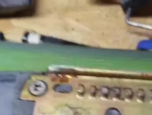 Final view after binding removal, showing the access to the binding screws.