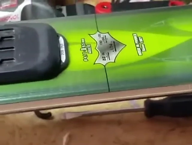 Close up view of the front mounting plate demonstrating how it slides back and forth.