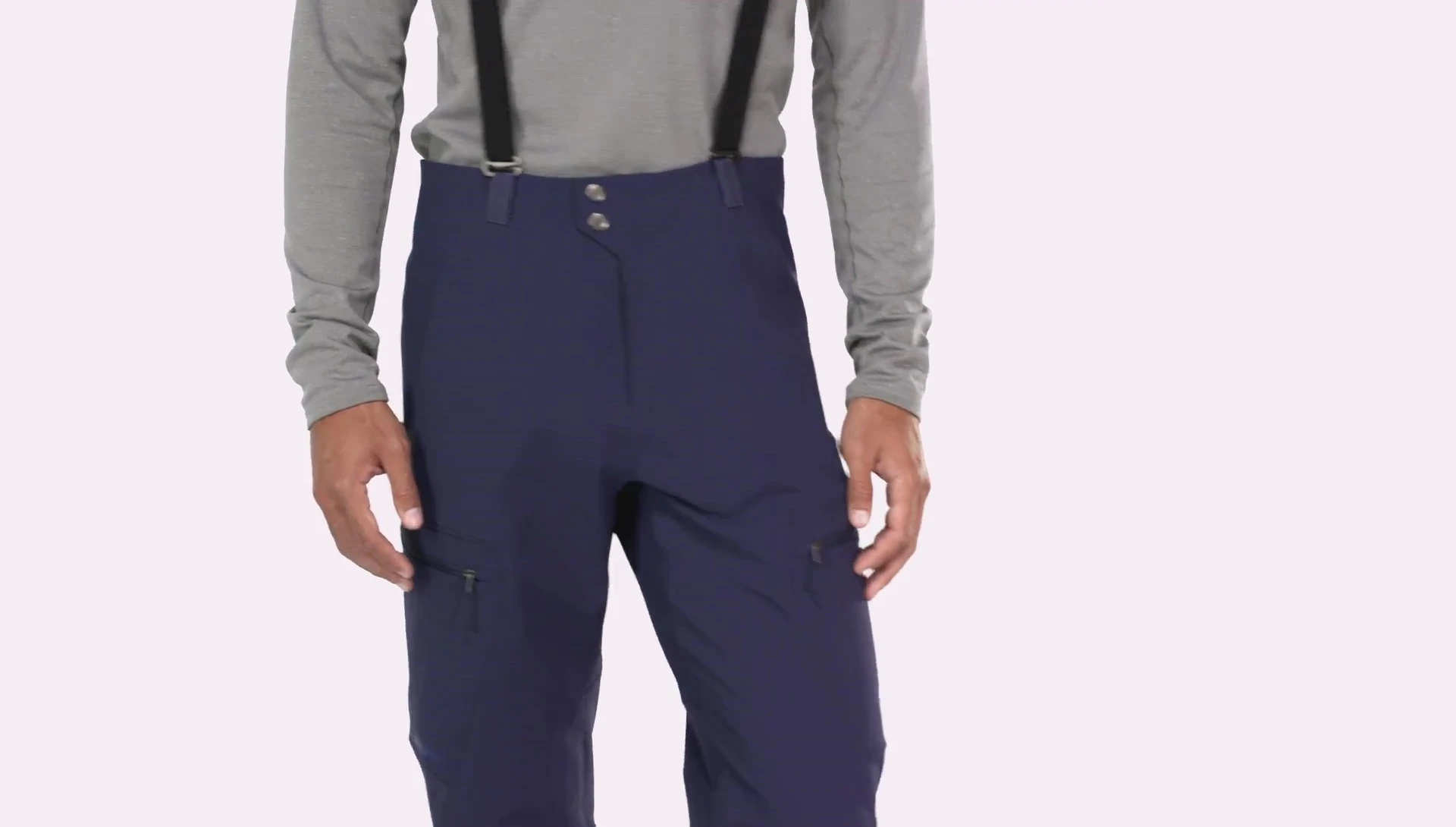 Final shot of a person wearing the pants, emphasizing their overall functionality and suitability for backcountry use.