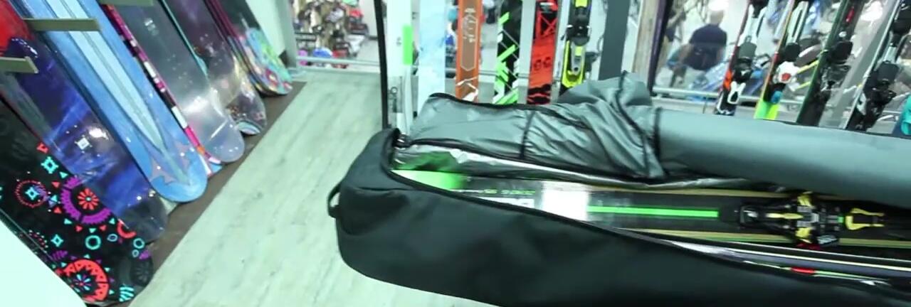 The double wheeled ski bag being shown.