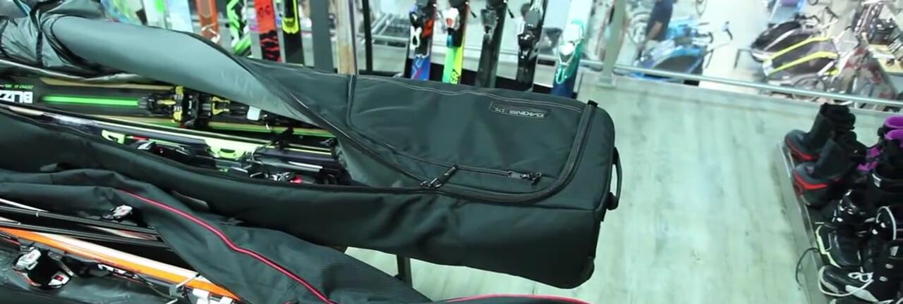 A final shot showing various ski bags and backpacks