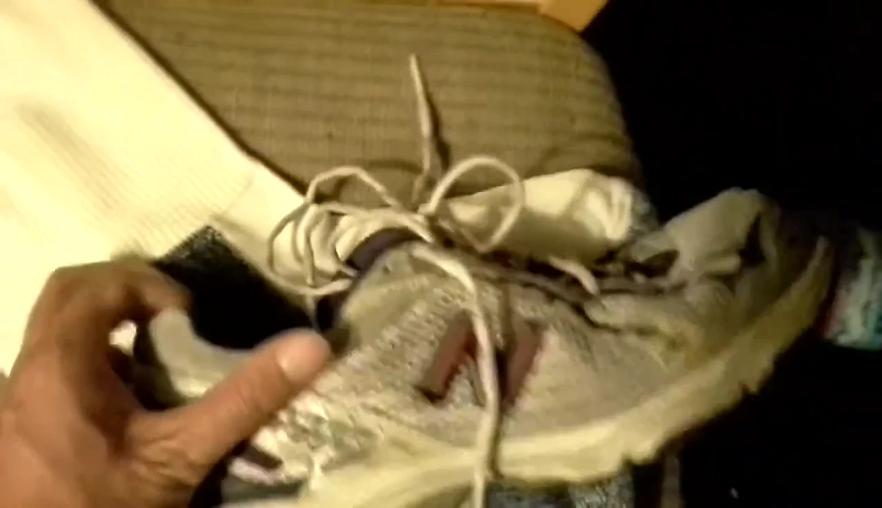 Shot of the socks being worn casually, showing how the color-blocking might look out of place