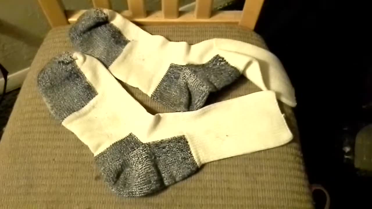Close-up shot of the ThorLo socks highlighting the unique color-blocked design