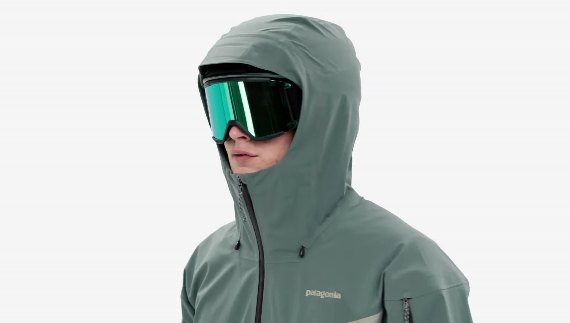 Model adjusting the hood of the jacket.