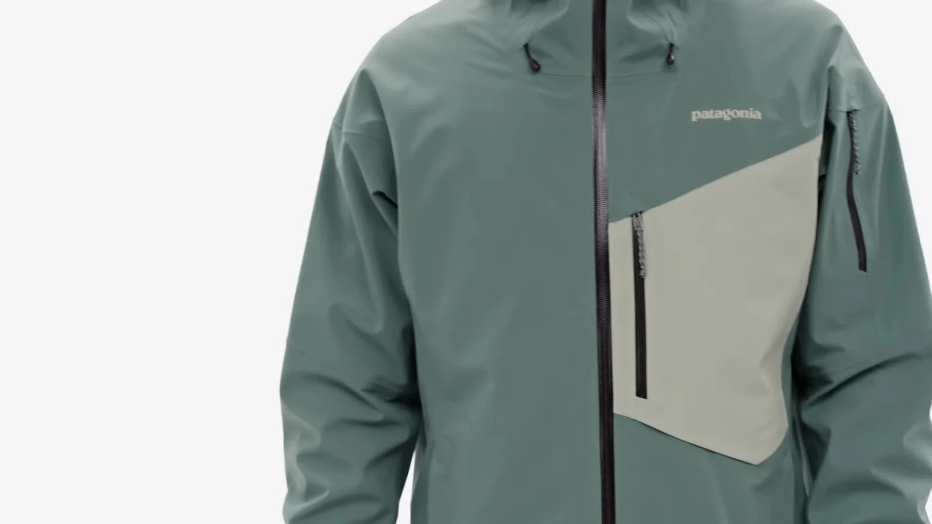 Close-up of the jacket's fabric showcasing its texture and waterproofness.