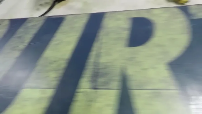 Scrape off any excess wax with a scraper.