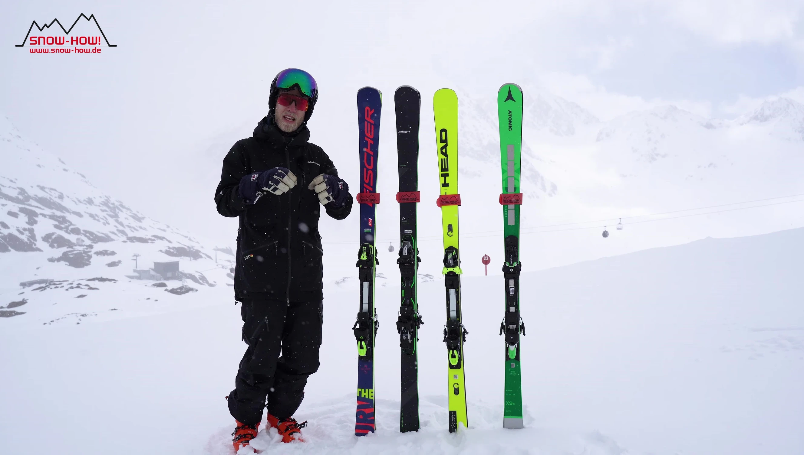 Skier making a turn on Atomic Redster X9S skis.