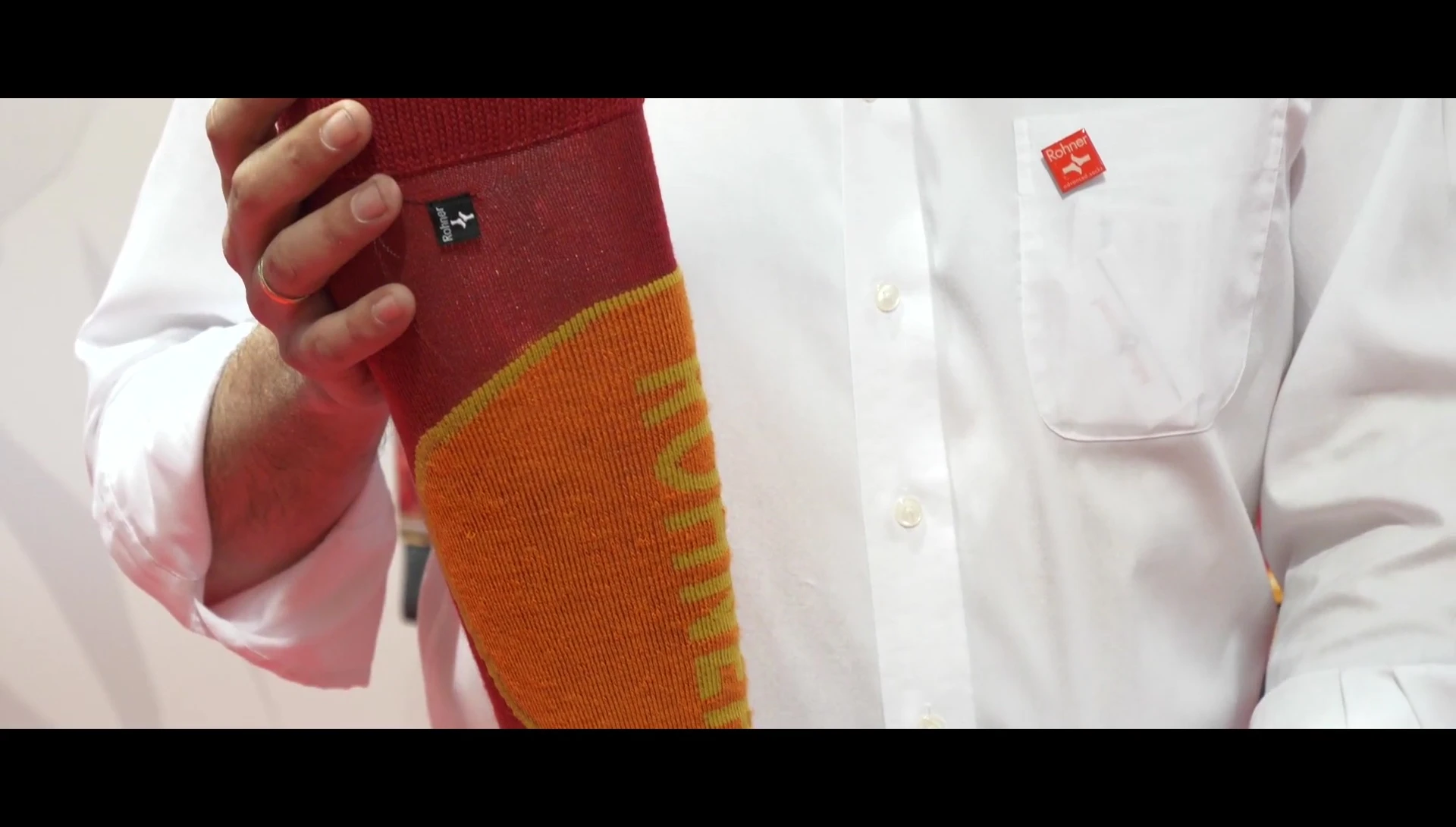 Rohner's pride in winning the award, demonstrating the quality of the socks.