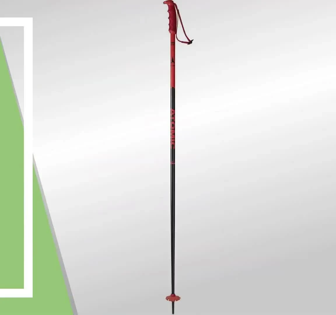 Close-up of Atomic ski poles showcasing the rubber grips and straps.