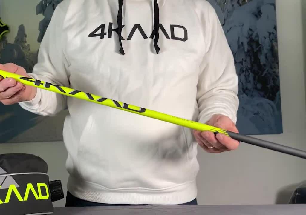 Close-up of the carbon fiber pole shaft, highlighting its texture and quality.